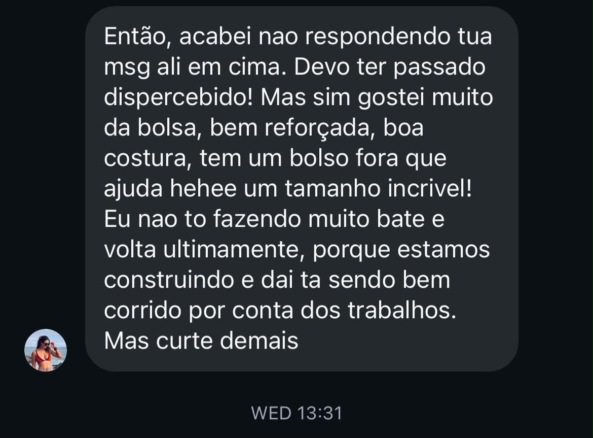 Cliente elogiando a qualidade, costura e tamanho da Buena Bag